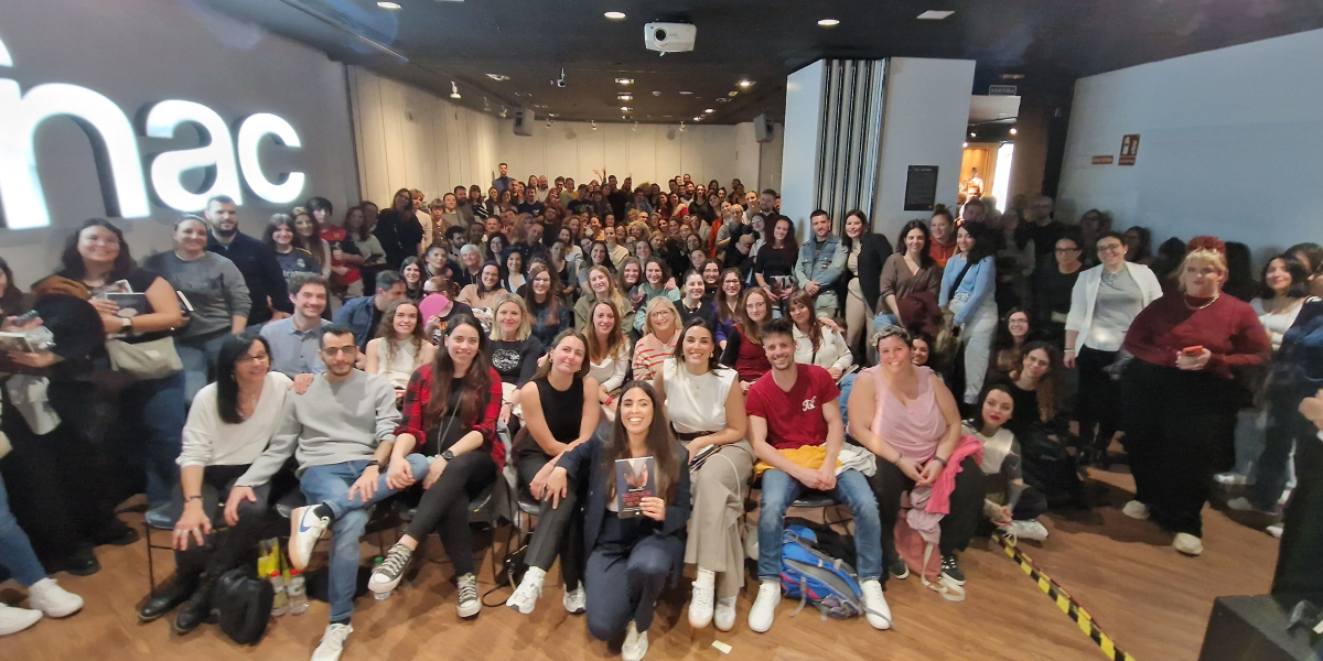 Sorayis and group at a conference about her book